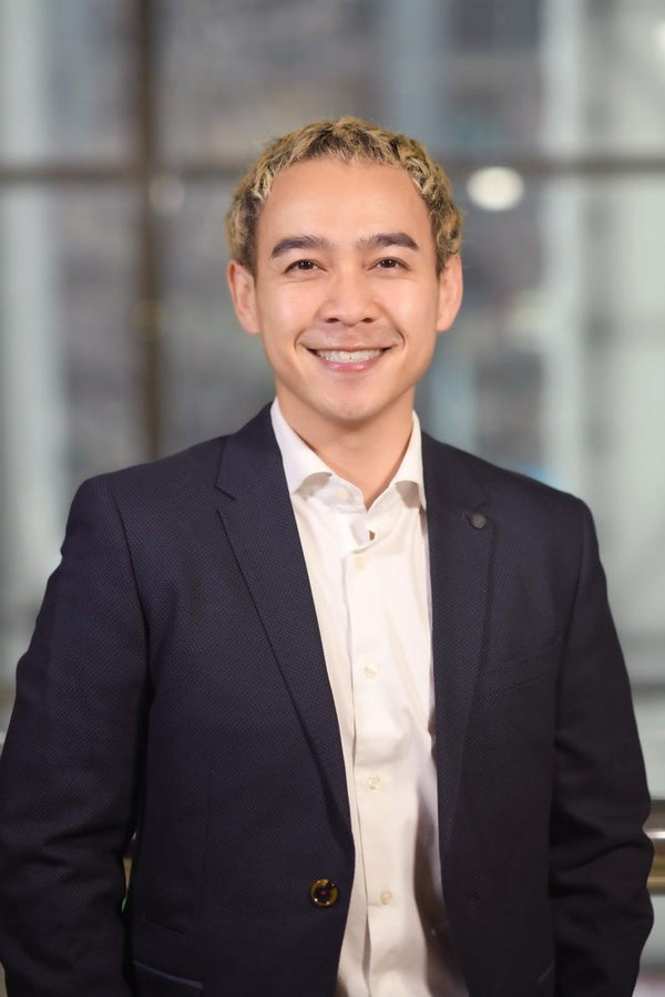 Professional headshot photographed at ThisPix studio in Midtown Manhattan