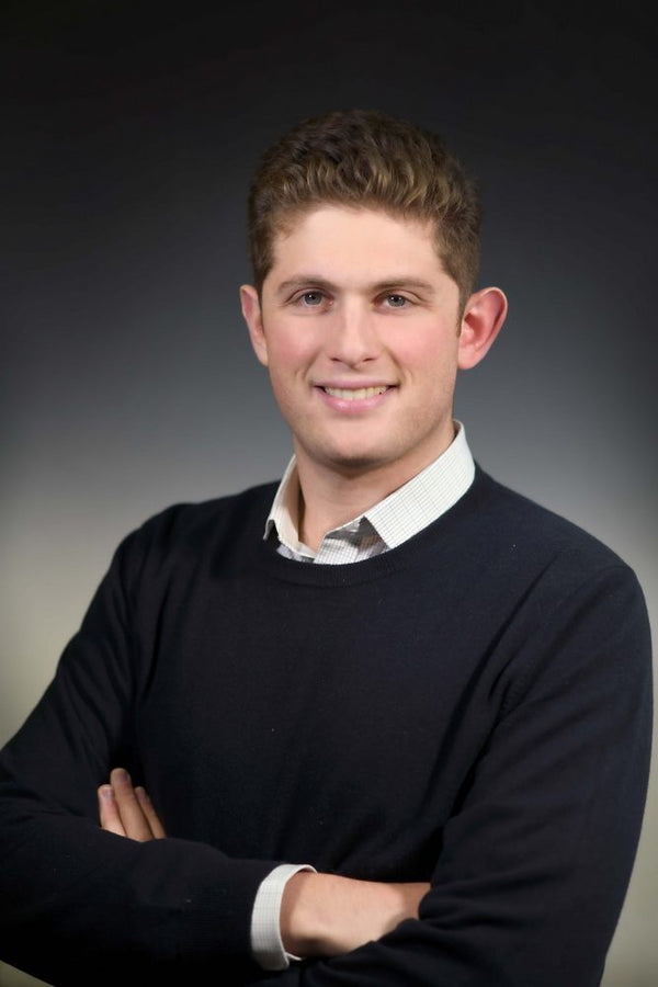 Professional headshot photographed at ThisPix studio in Midtown Manhattan