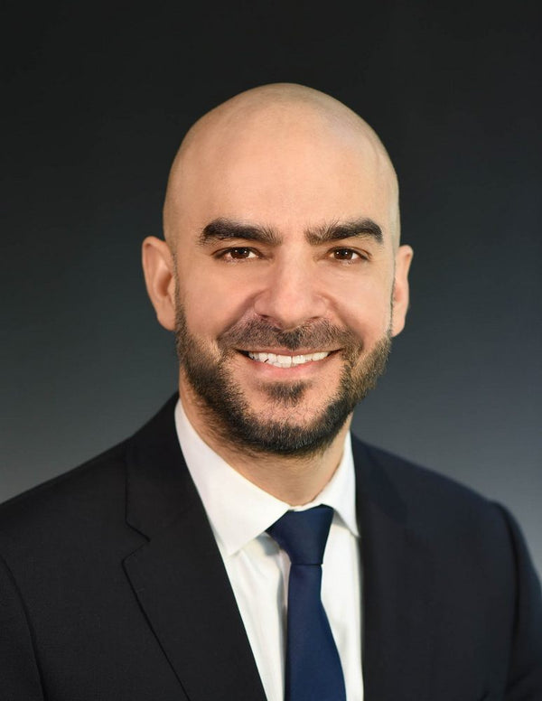 Professional headshot photographed at ThisPix studio in Midtown Manhattan