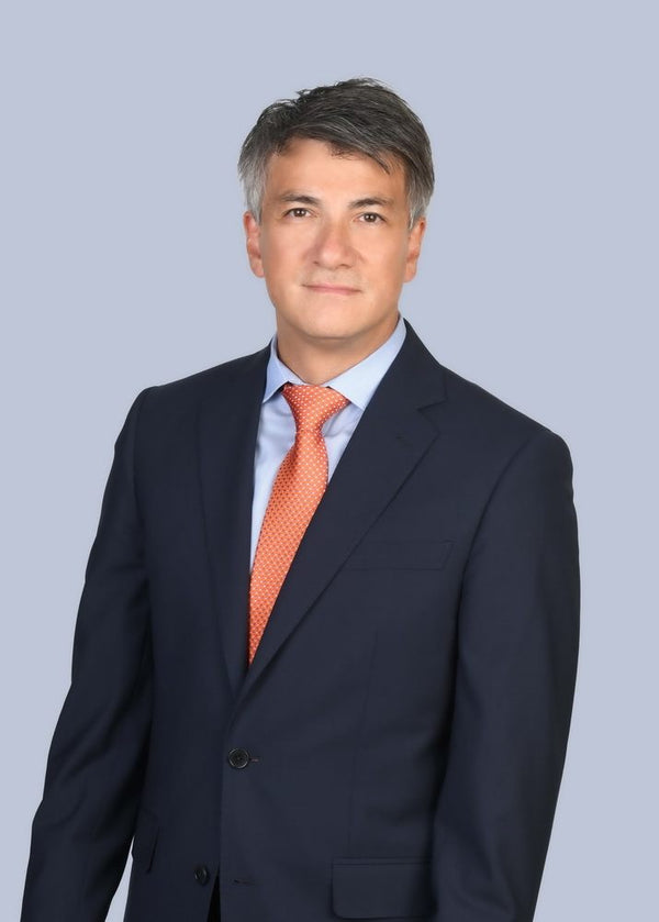 Professional headshot photographed at ThisPix studio in Midtown Manhattan