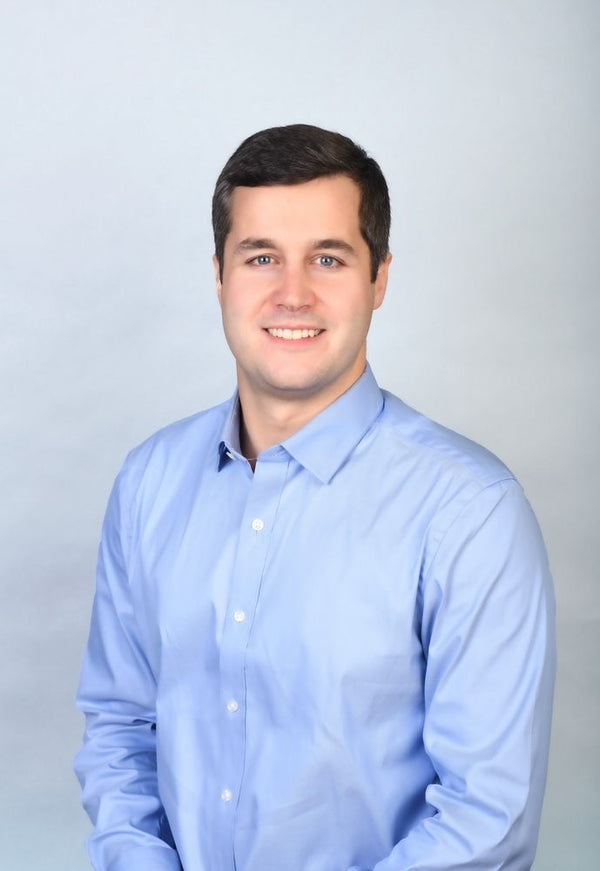 Professional headshot photographed at ThisPix studio in Midtown Manhattan