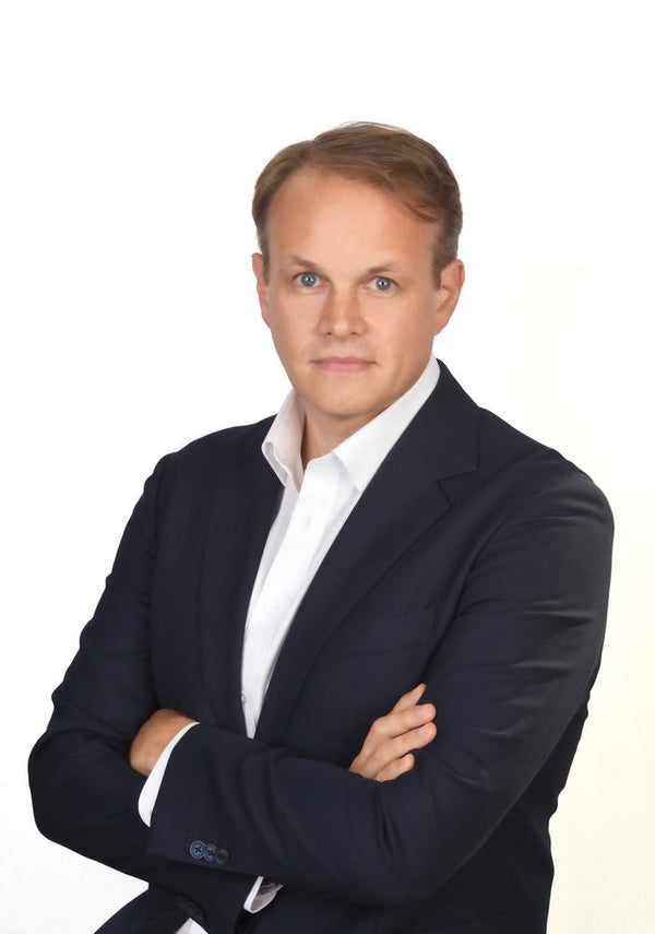 Professional headshot photographed at ThisPix studio in Midtown Manhattan