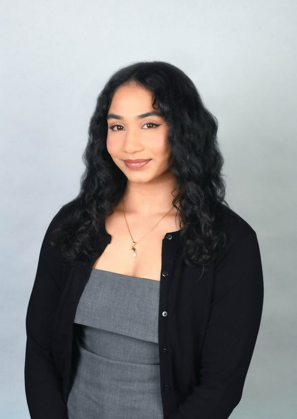 Professional headshot photographed at ThisPix studio in Midtown Manhattan