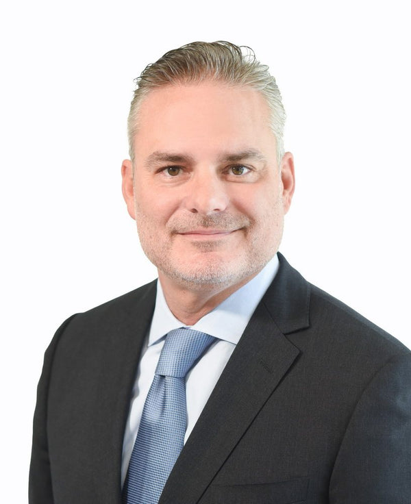 Professional headshot photographed at ThisPix studio in Midtown Manhattan