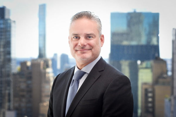 Professional headshot photographed at ThisPix studio in Midtown Manhattan