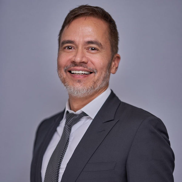 Professional headshot photographed at ThisPix studio in Midtown Manhattan
