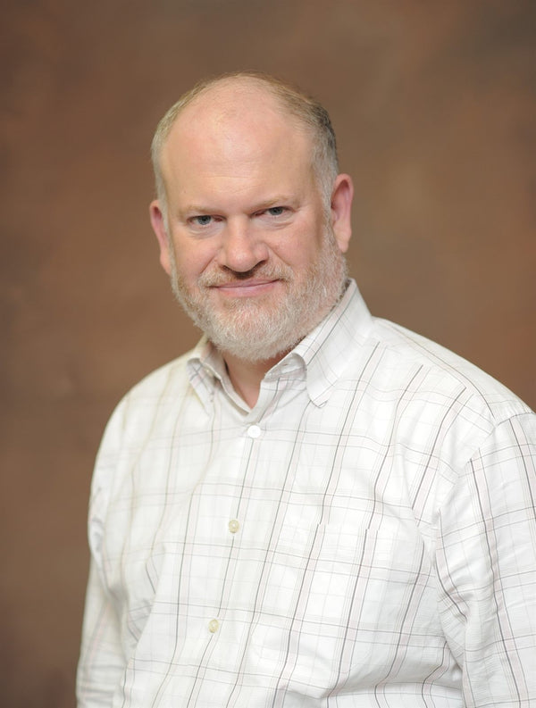 Professional headshot photographed at ThisPix studio in Midtown Manhattan